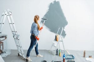Female painting Room with grey